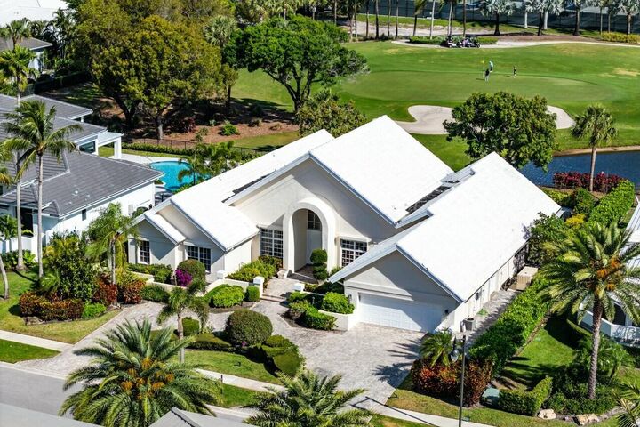 Property Photo: 4869 Tallowwood Lane FL 33487