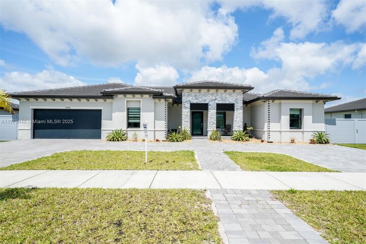 Property Photo:  19080 SW 133 Ct  FL 33177 