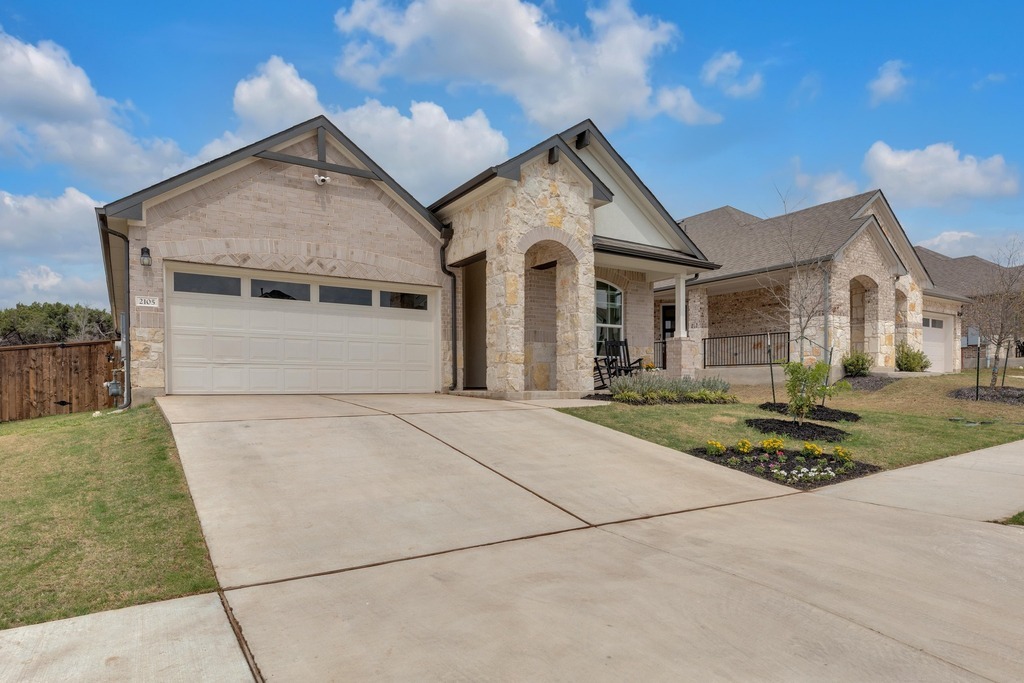 Property Photo: 2105 Rosin Jaw Walk TX 78641