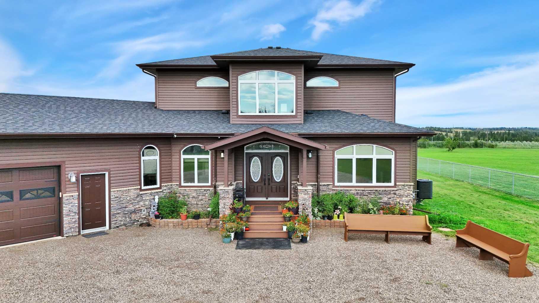 Property Photo: 27240 Township Road 392 242 AB T4S 1X5