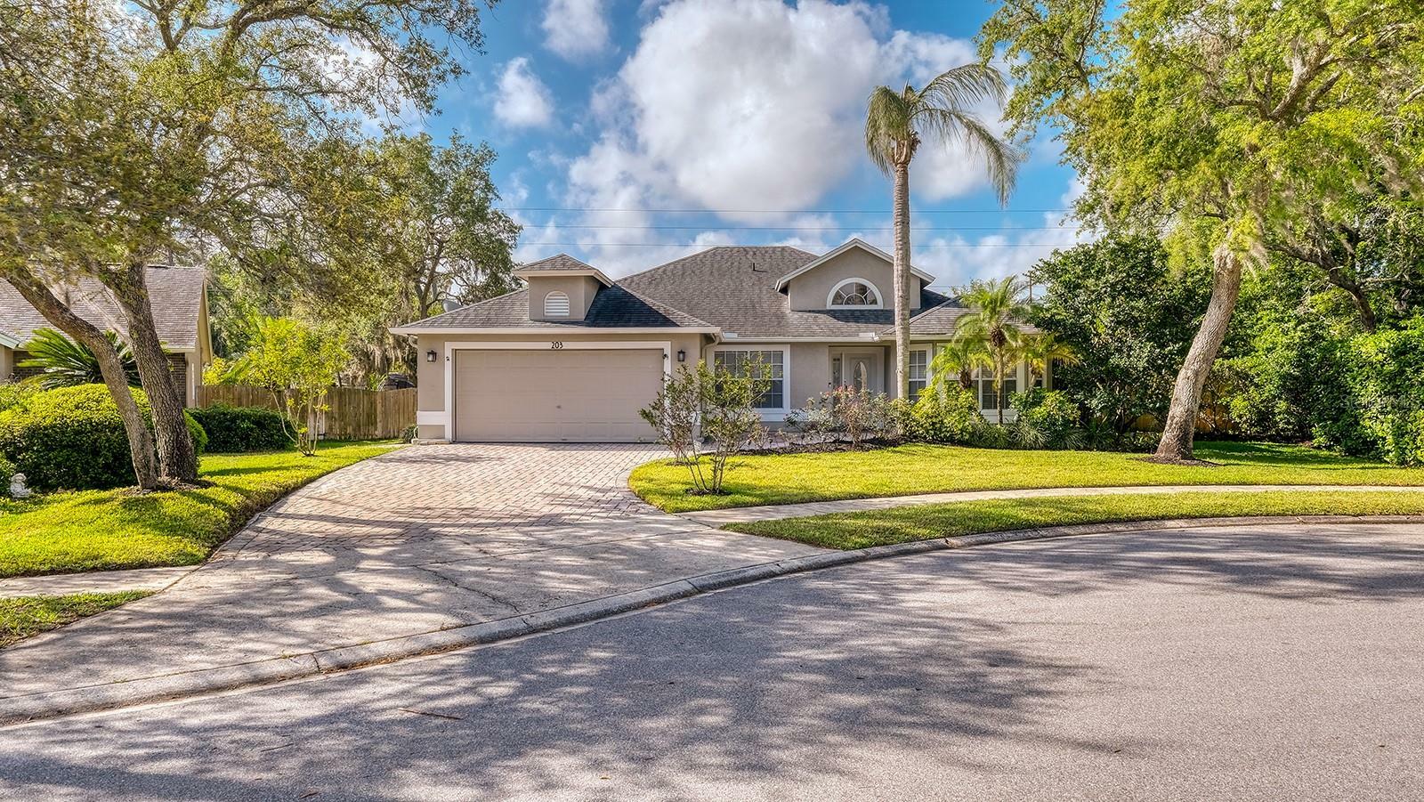 Property Photo: 203 Red Bud Court FL 32746