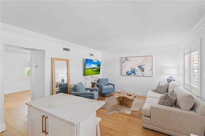 Property Photo:  980 7th Ave S 107  FL 34102 