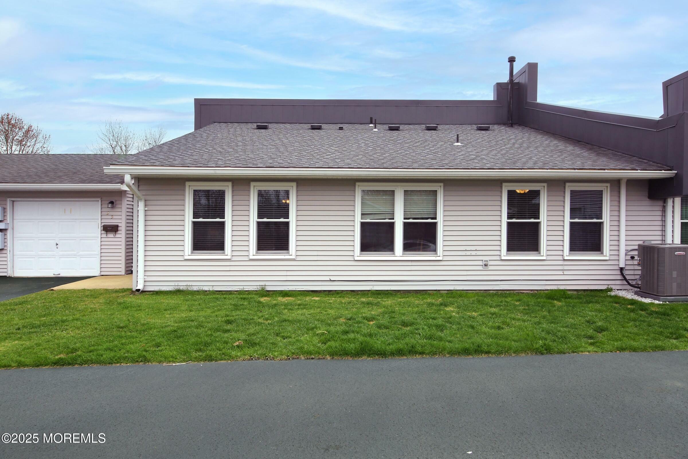 Property Photo: 25 Sutton Drive 2401 NJ 08724