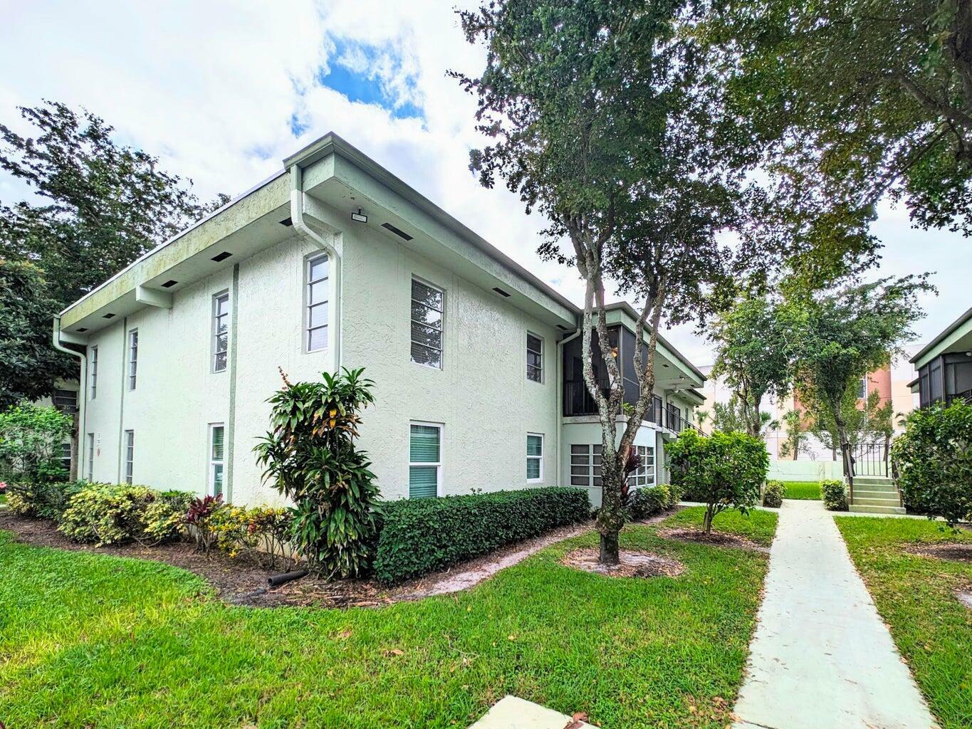 Property Photo: 7515 S Oriole Boulevard NW 203 FL 33446