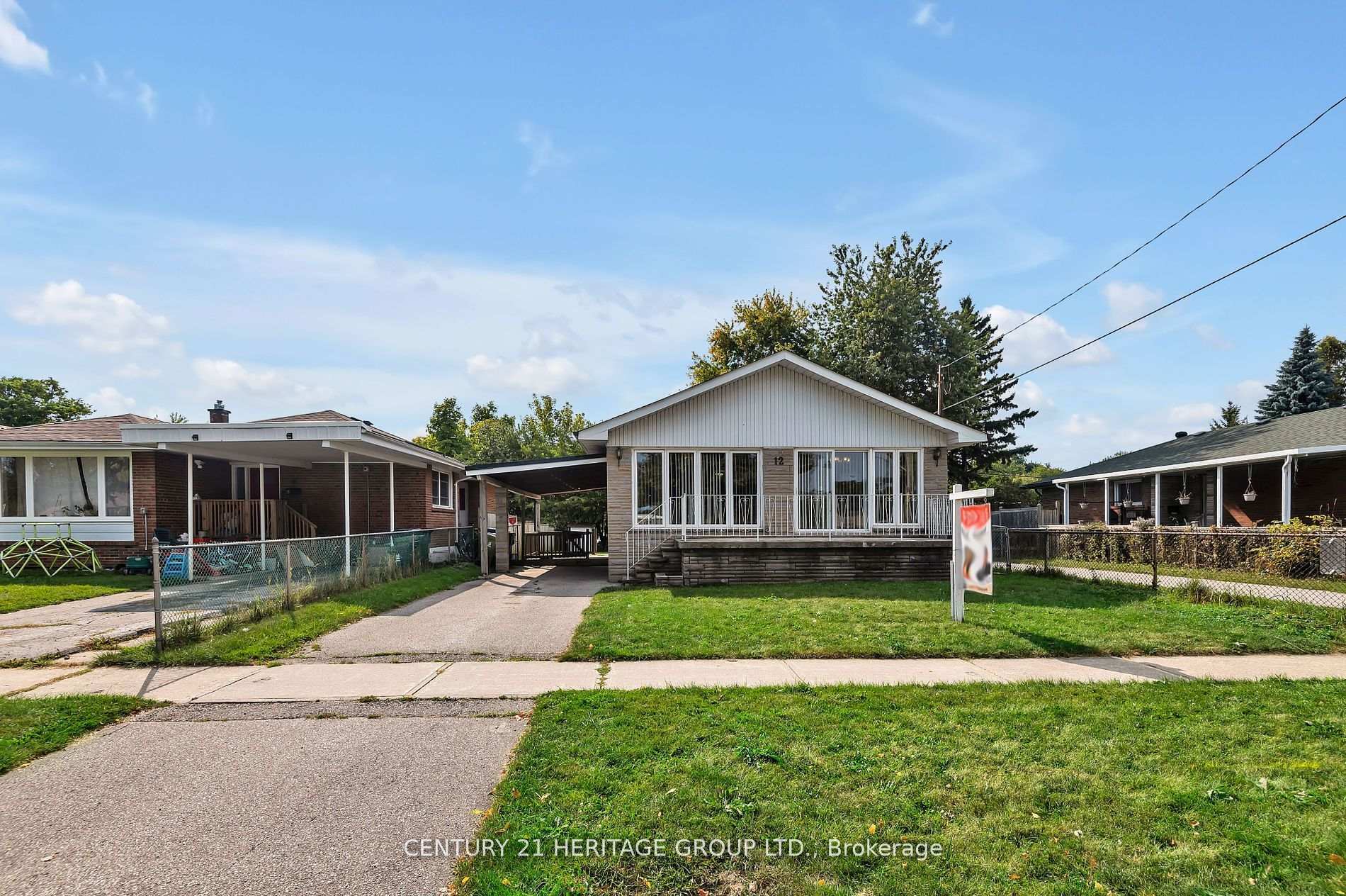 Photo de la propriété: 12 Kitson Drive ON M1M 3C8