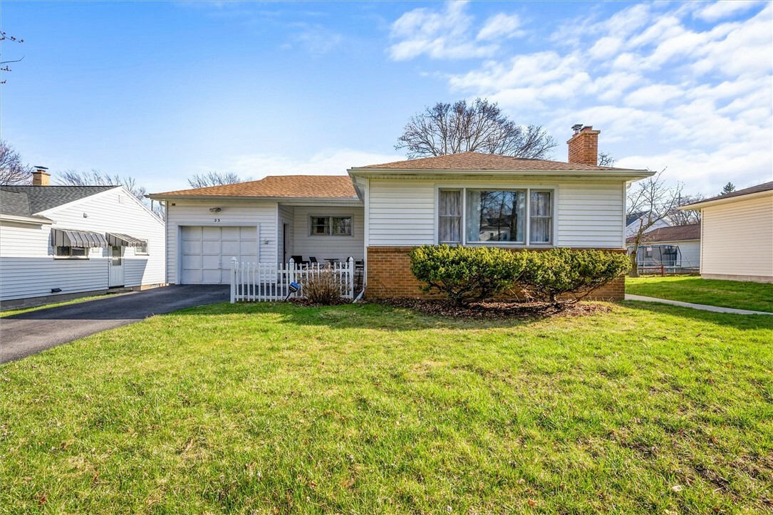 Property Photo: 23 Meadowcroft Road NY 14609