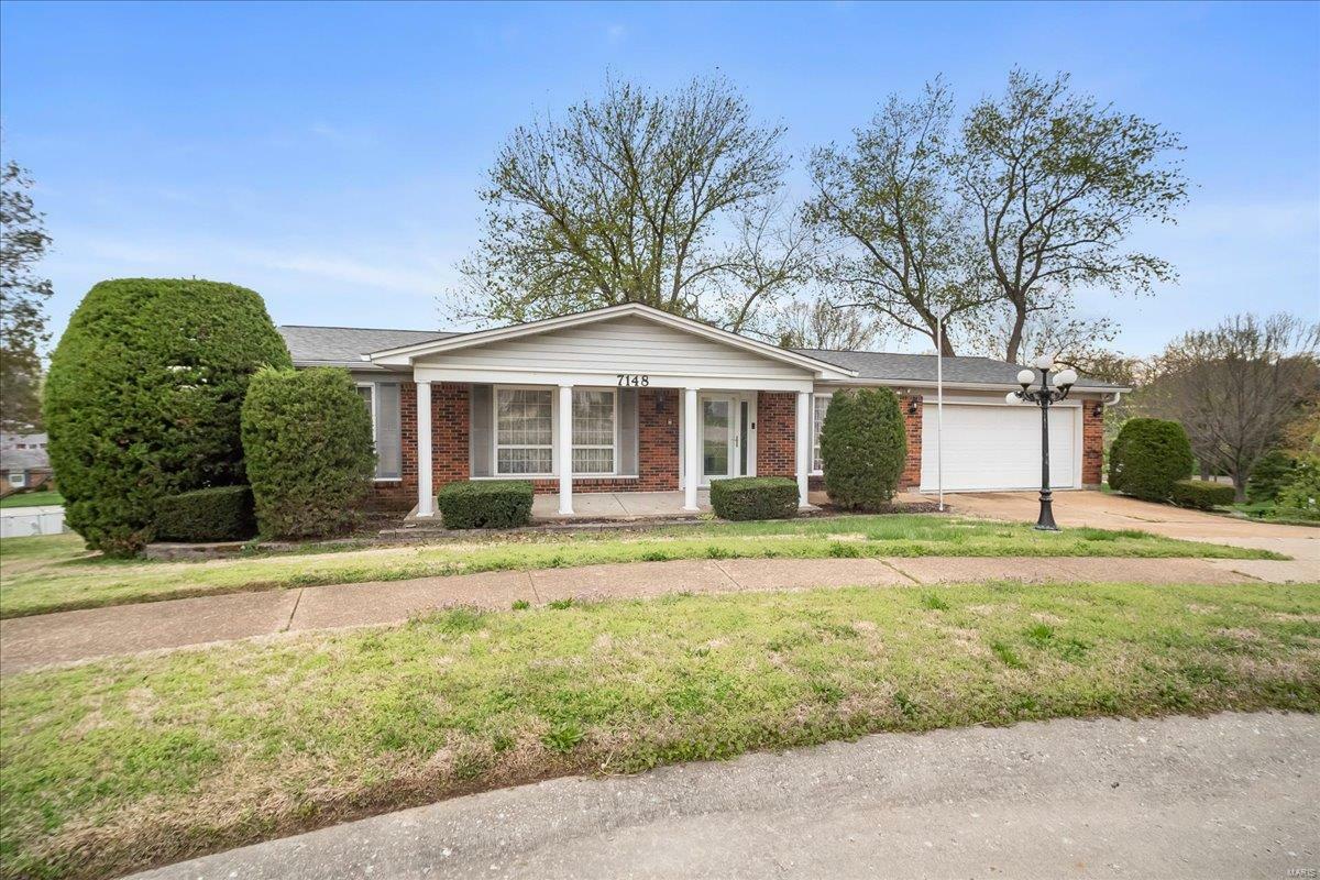 Property Photo: 7148 Hollymont Drive MO 63123