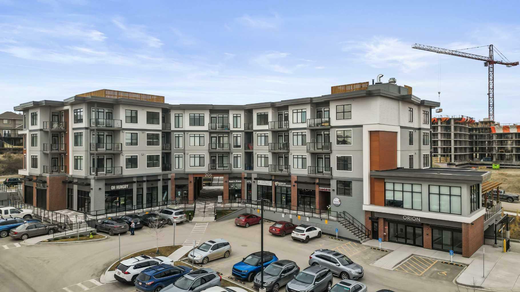 Property Photo: 205 Spring Creek Common SW 404 AB T3H 6H4