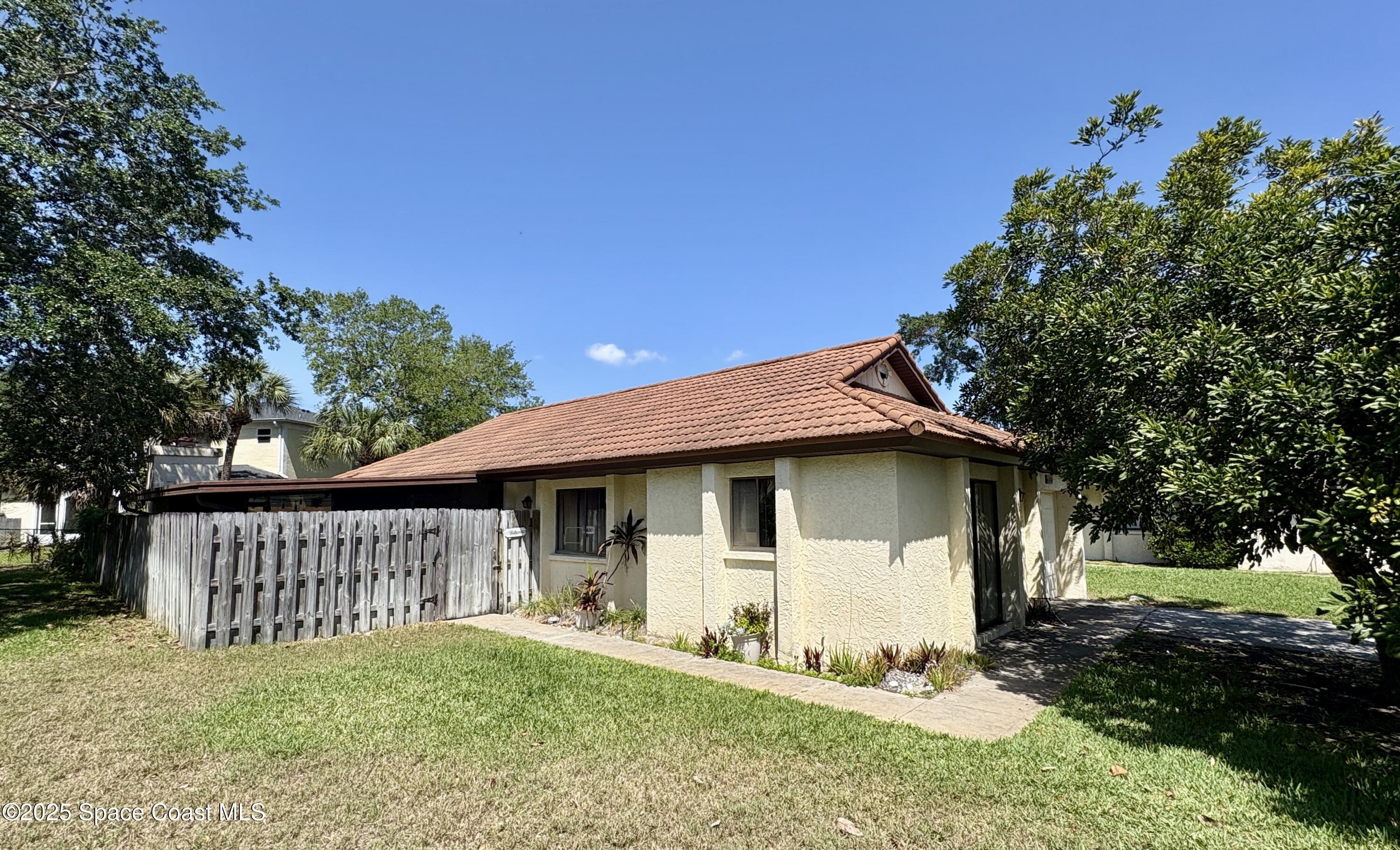 Property Photo: 8759 Banyan Way FL 32920