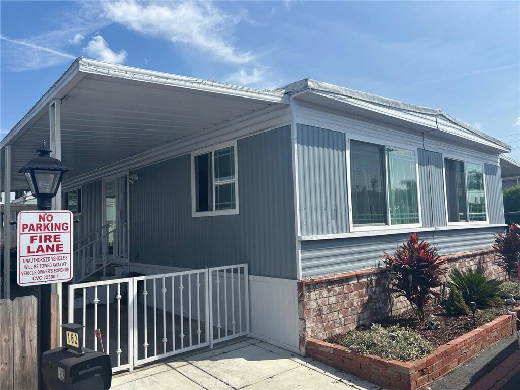 Property Photo:  12861 West St 162  CA 92840 