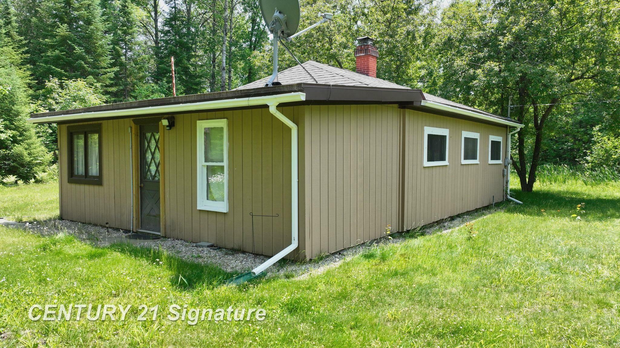 Property Photo: 6002 Wildwood Drive MI 48610