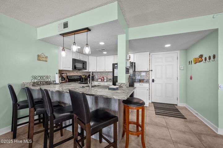 Property Photo:  2000 New River Inlet Road 2606  NC 28460 