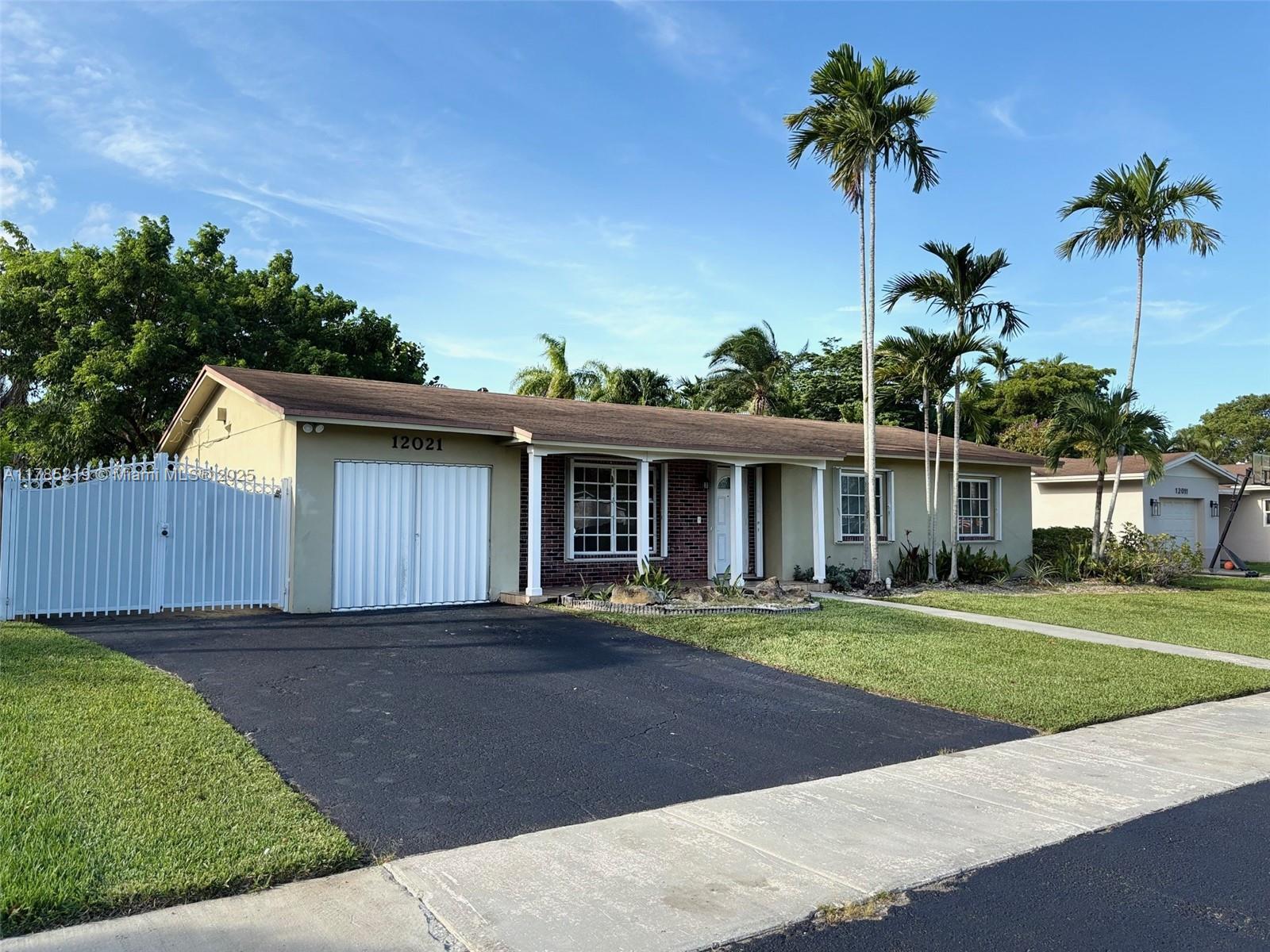 Property Photo: 12021 SW 119th St FL 33186