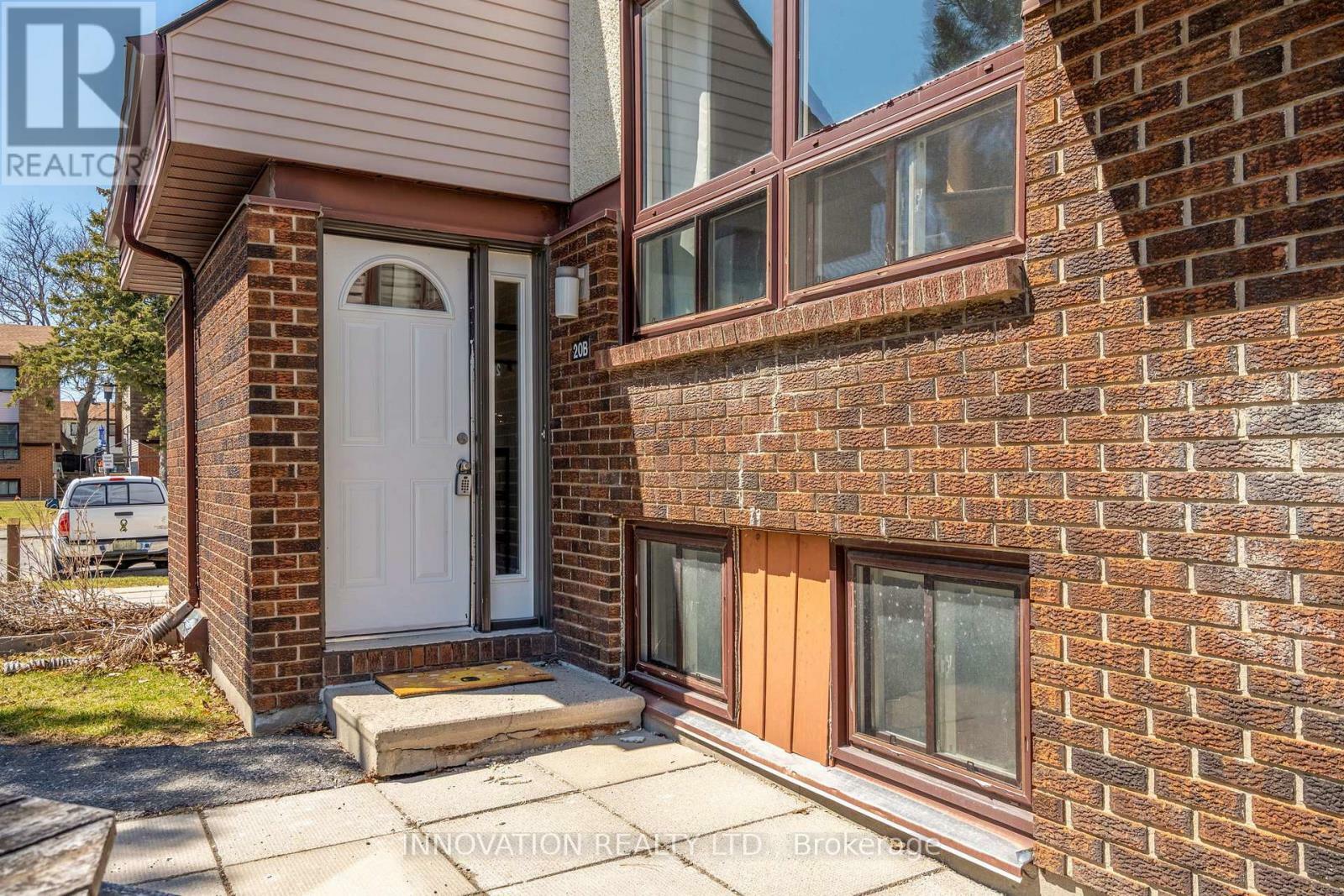 Property Photo: 20 Woodvale Green B ON K2G 4H2