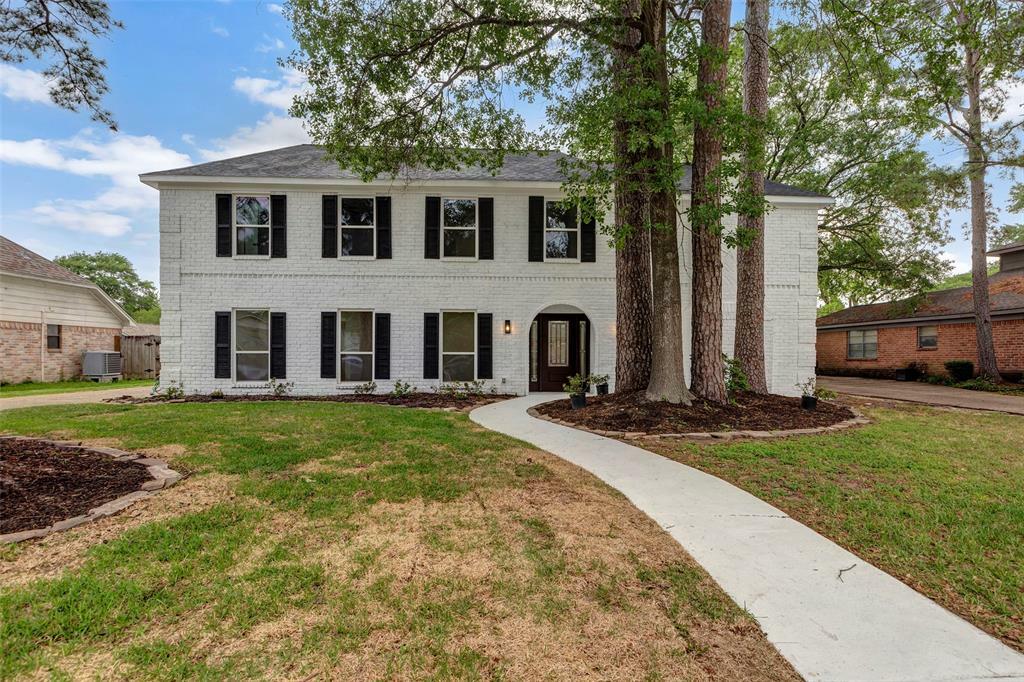 Property Photo: 7707 12th Fairway Lane TX 77346