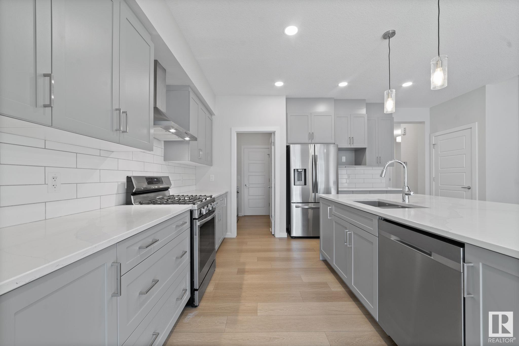 Property Photo: 2431 207 Street NW AB T6M 1P1