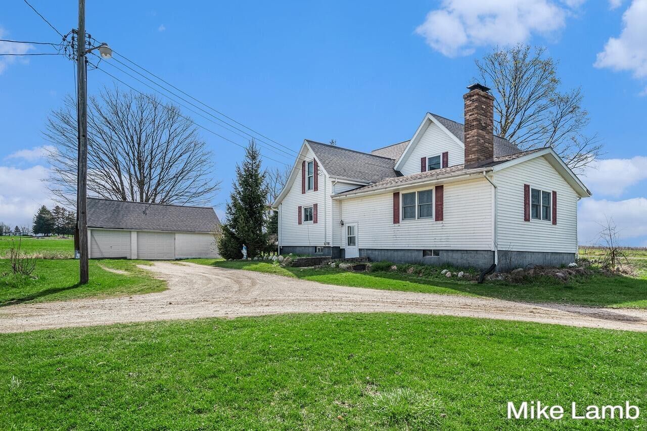 Property Photo:  4297 Lutheran Church Road NW  MI 49330 