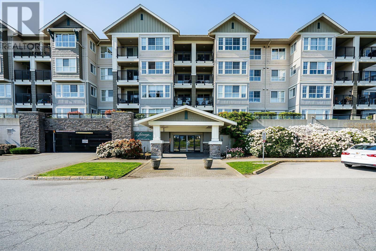Property Photo: 19673 Meadow Gardens Way 123 BC V3Y 0A1