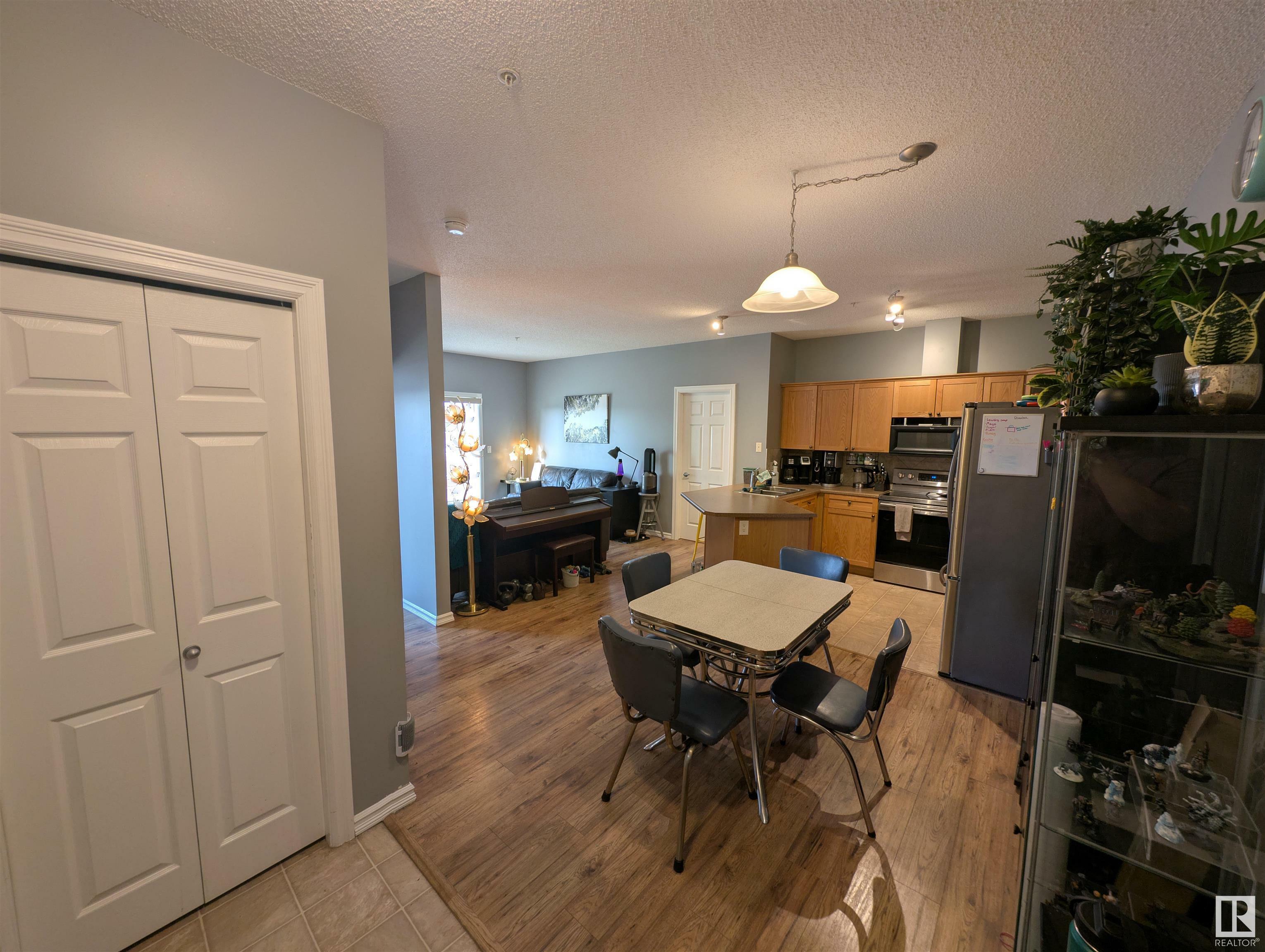 Property Photo: 226 Macewan Road SW 208 AB T6W 0C5