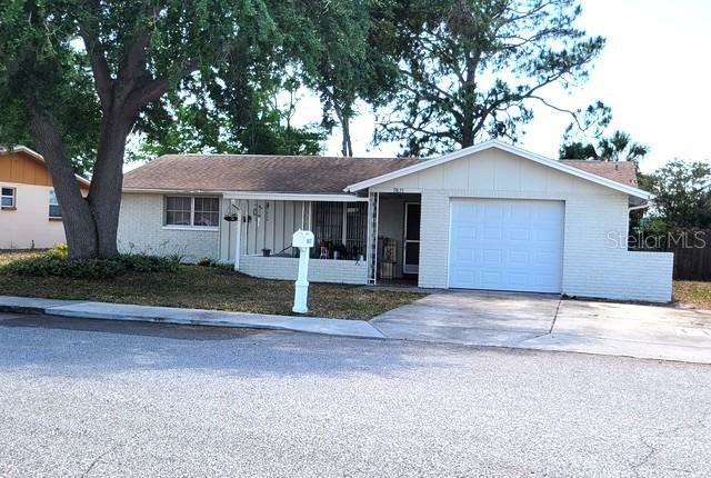 Property Photo: 9835 El Camino Real Avenue FL 34668