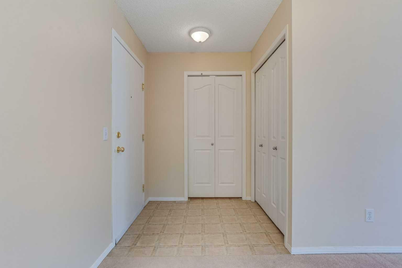 Property Photo: 304 Mackenzie Way SW 8421 AB T4B 3H8
