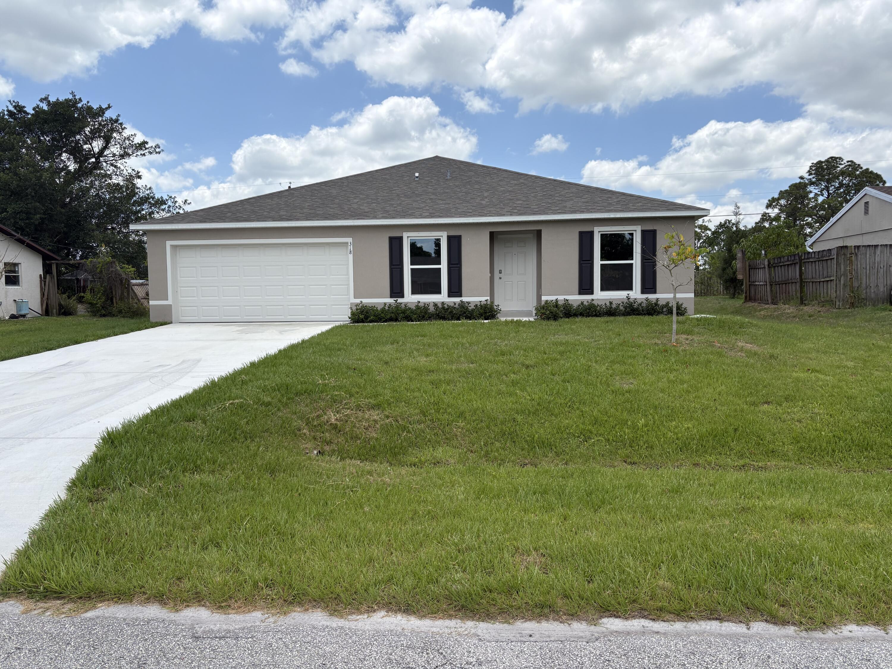 Property Photo: 318 SE Dalva Avenue FL 34984