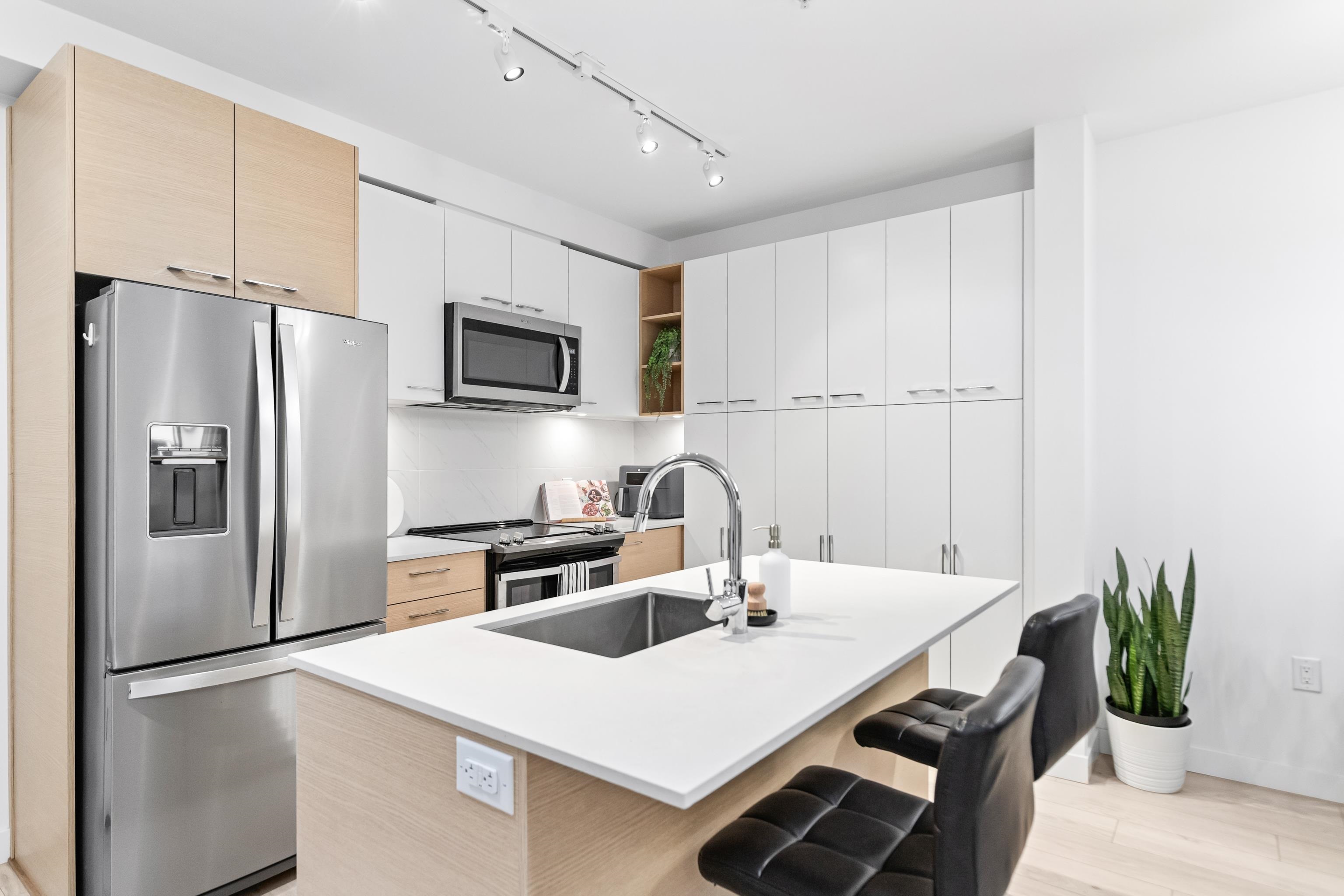 Property Photo: 13963 105 Boulevard 311 BC V3T 0M9