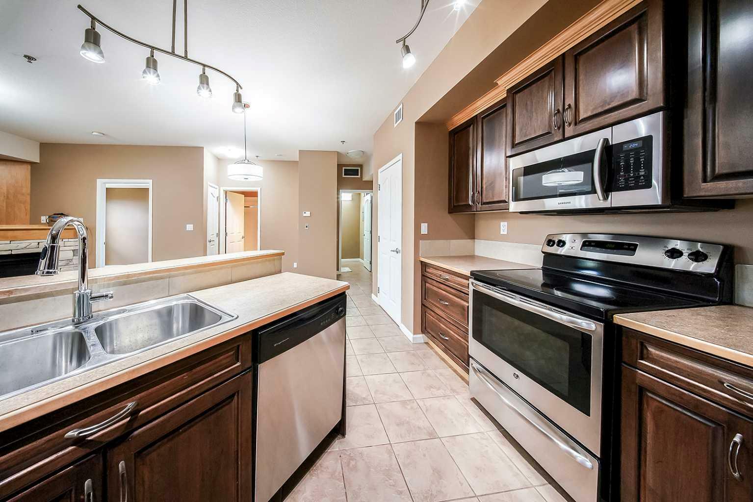 Property Photo: 5040 53 Street 207 AB T4S 0A1