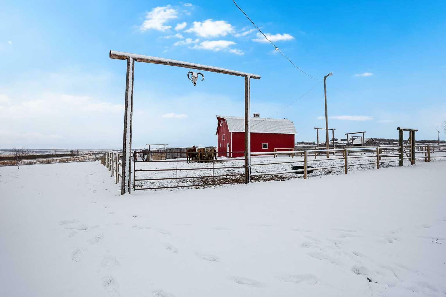 Property Photo: 386243 16 Street W AB T1S 6A7