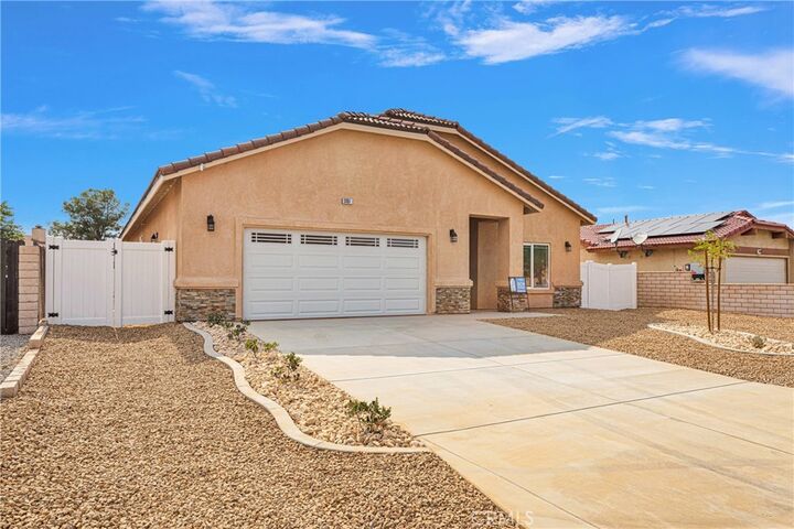 Property Photo: 13851 Topmast Drive CA 92342