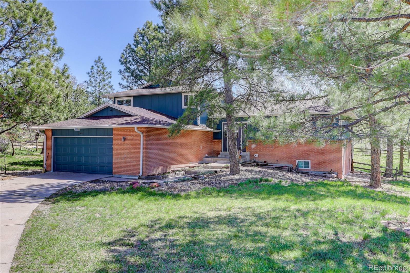 Property Photo: 7420 Windwood Way CO 80134