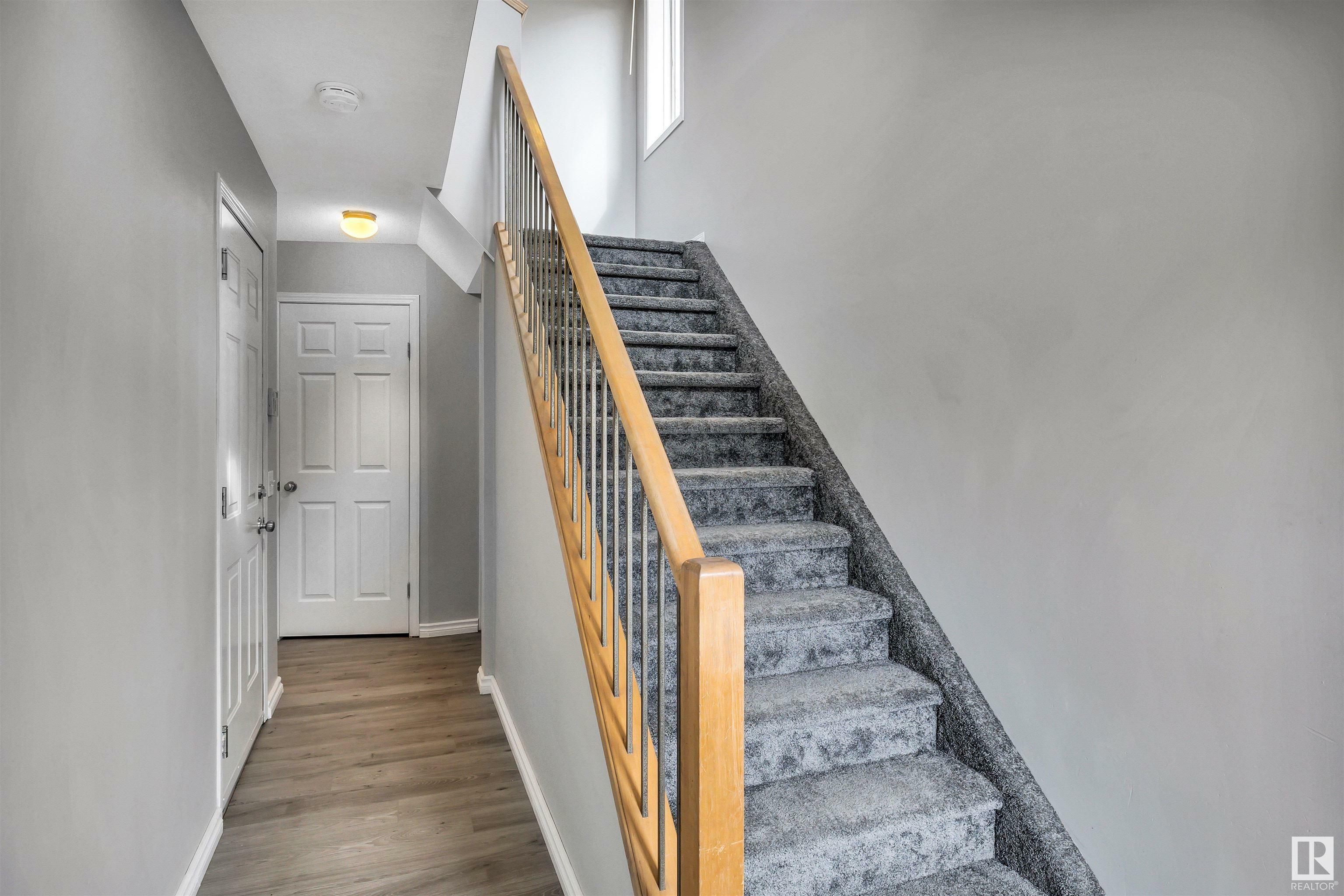 Property Photo: 230 Edwards Drive SW 100 AB T6X 1G7