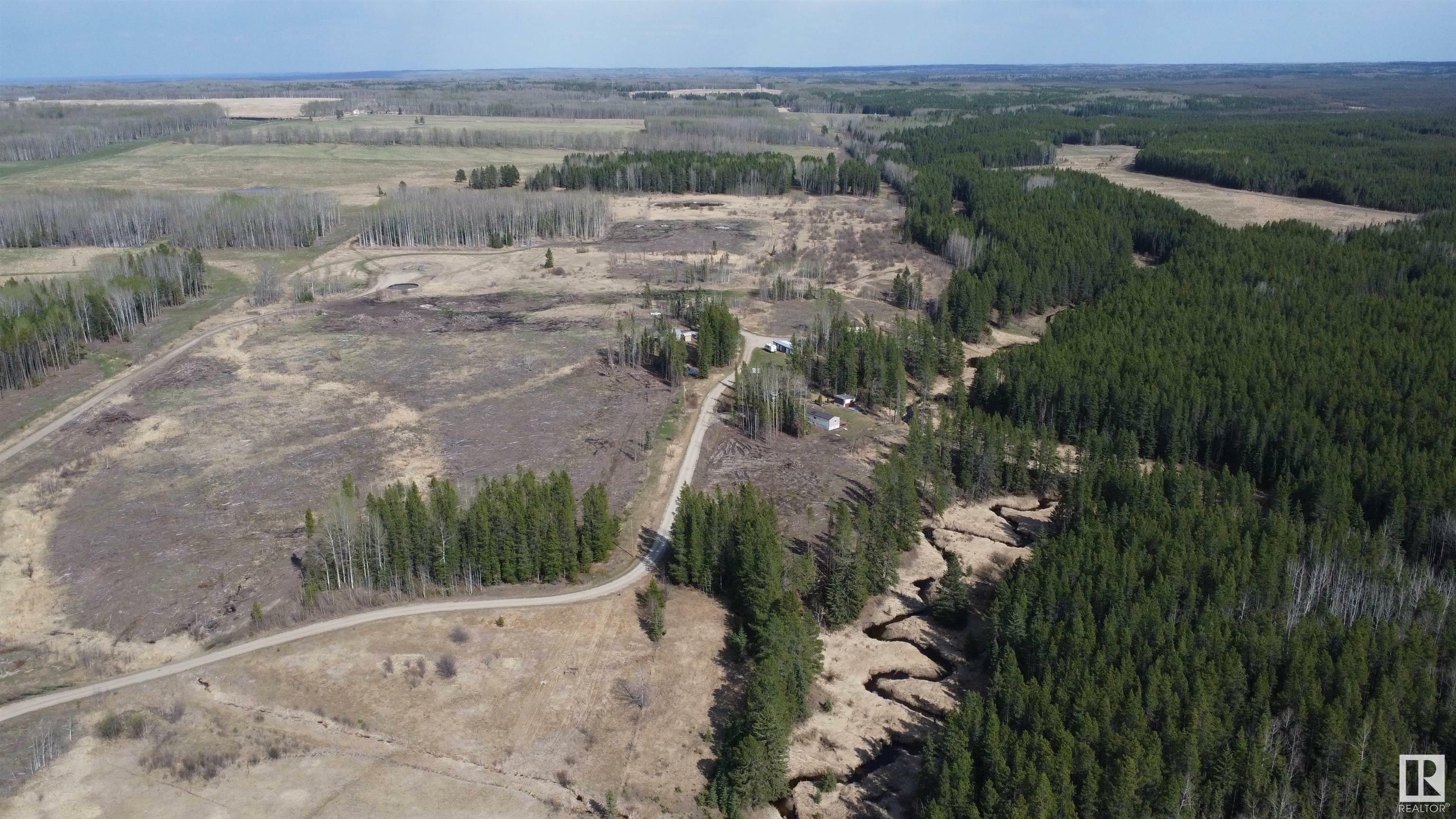 Property Photo: 450059B,C,D Hwy 22 AB T0C 0T0