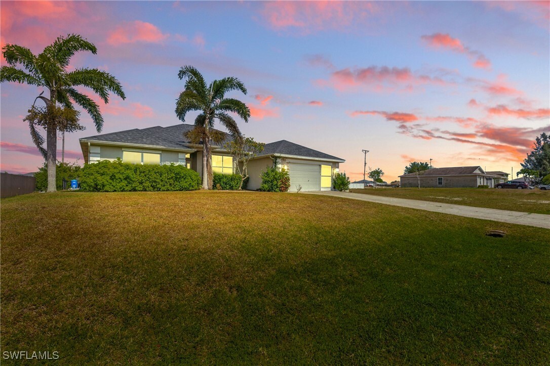 Property Photo: 1409 NW Juanita Place FL 33993