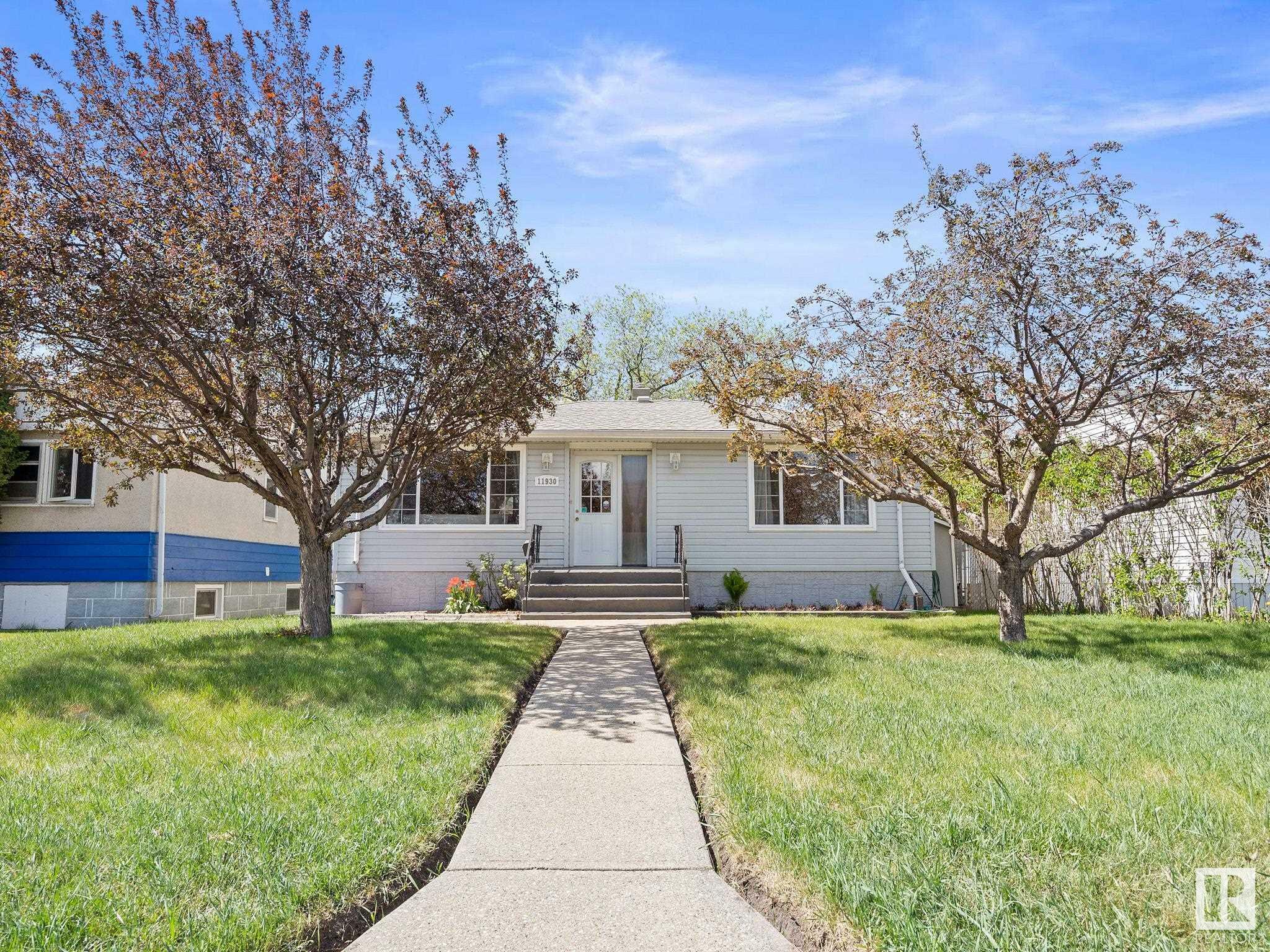 Property Photo: 11930 50 Street NW AB T5W 3C2