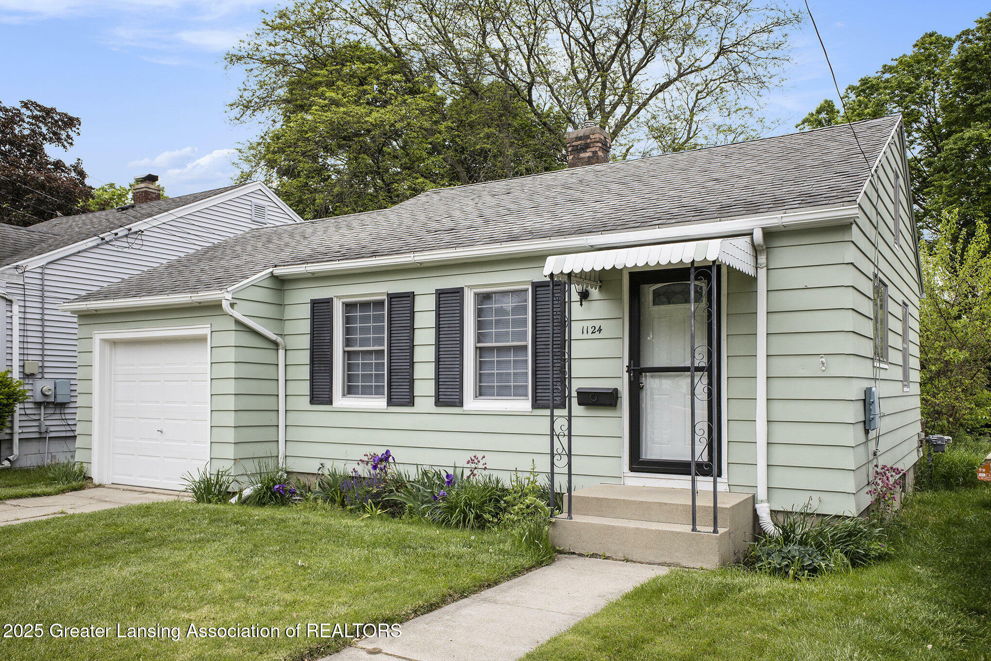 Property Photo: 1124 Poxson Avenue MI 48910