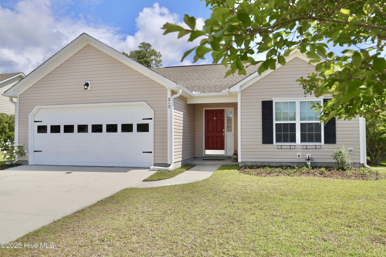 Property Photo: 212 Red Carnation Drive NC 28445