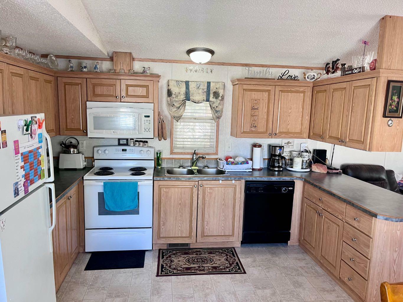 Property Photo: 145 East River Road 8 AB T7V 1S2