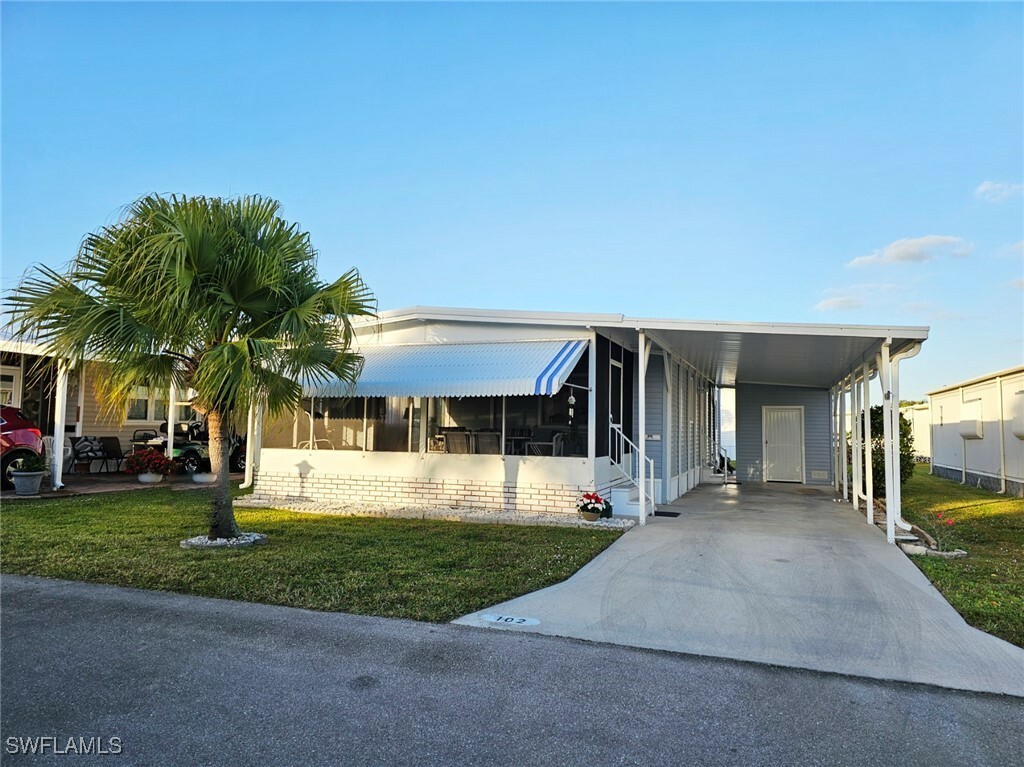 Property Photo: 102 Poinsettia Drive FL 33905