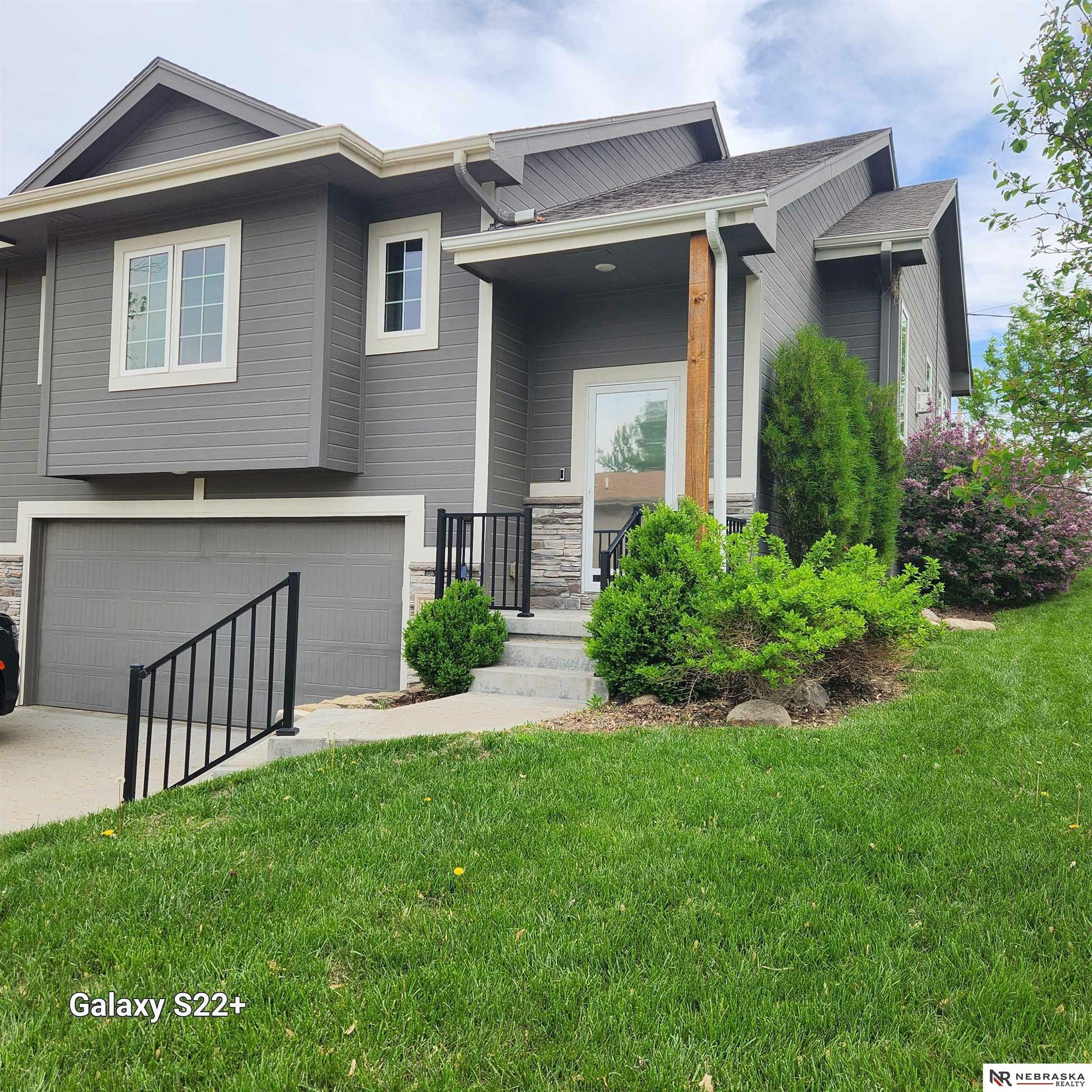 Property Photo: 6005 N 108th Avenue Circle NE 68164