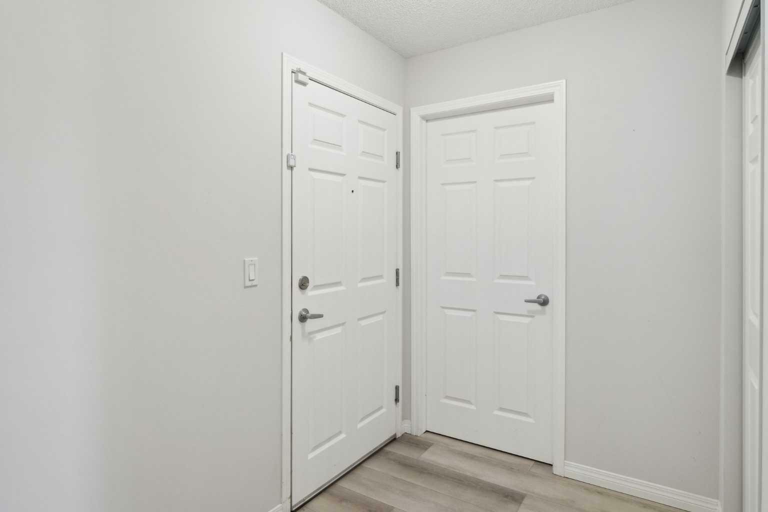 Property Photo: 2022 Canyon Meadows Drive SE 111 AB T2J 7H1