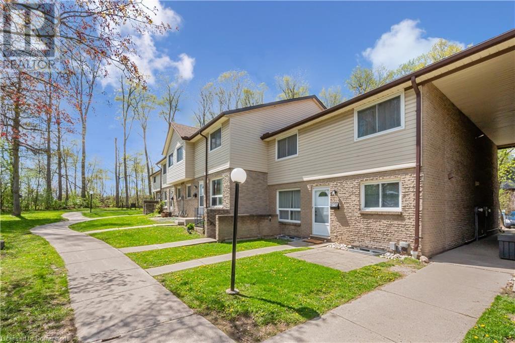 Property Photo: 453 Albert Street 13 ON N2L 5A7