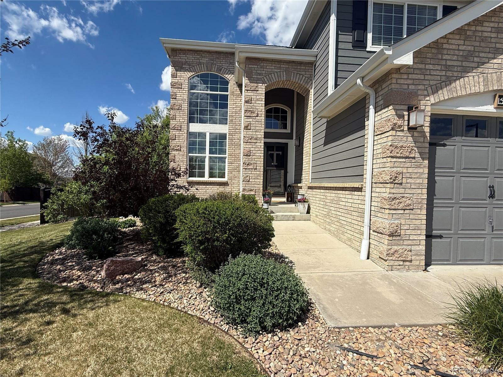 Property Photo: 15915 E Summit Fox Avenue CO 80134