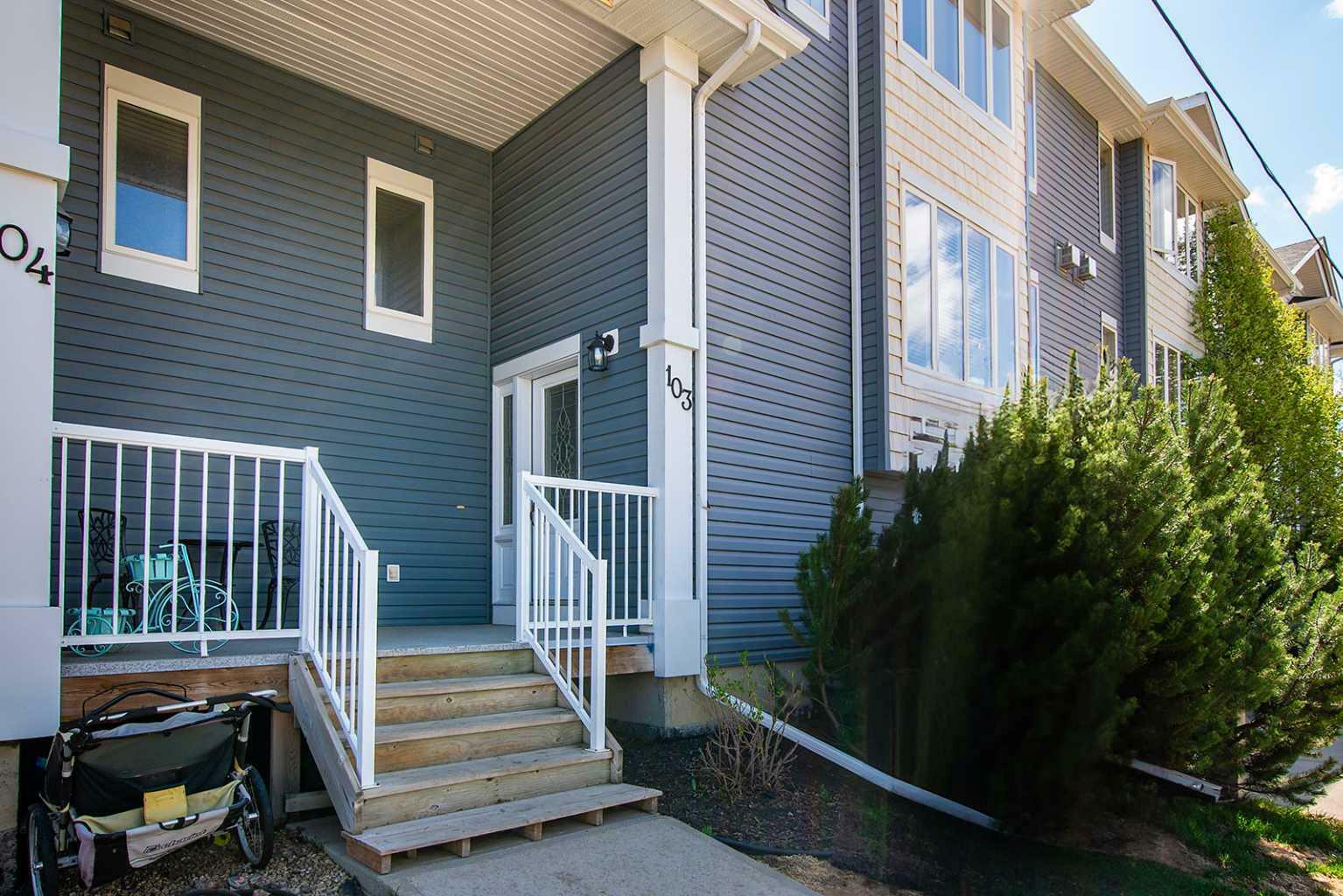 Property Photo: 5015 52 Street 103 AB T4S 1E6