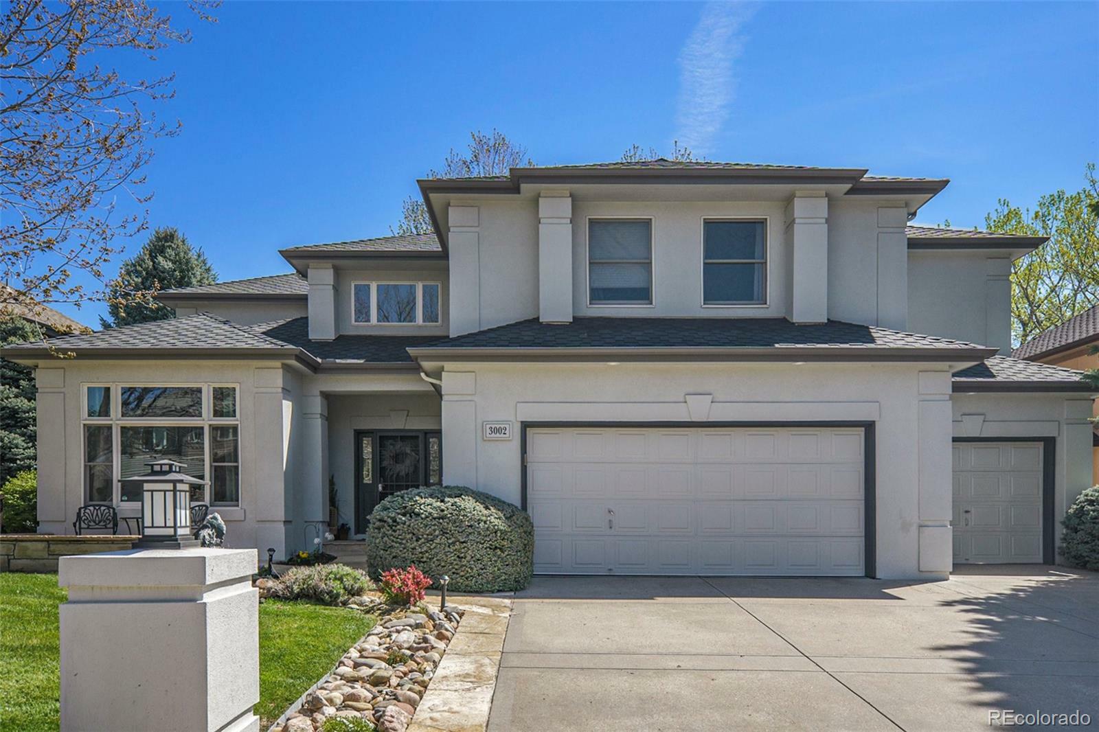 Property Photo: 3002 S Oak Way CO 80227