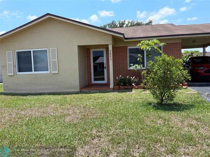Property Photo: 9802 NW 71st St FL 33321