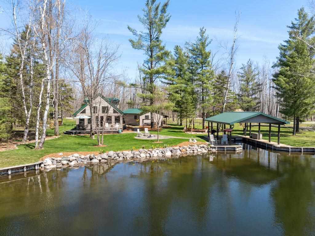 Property Photo: 8282 Devils Elbow MI 49716