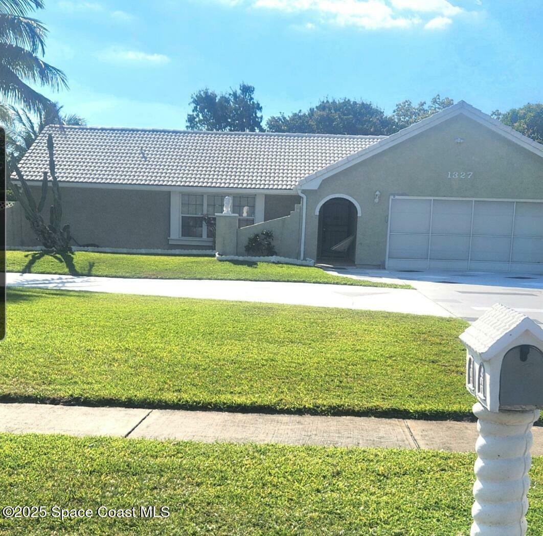 Property Photo: 1327 Cherry Hills Road NE FL 32905