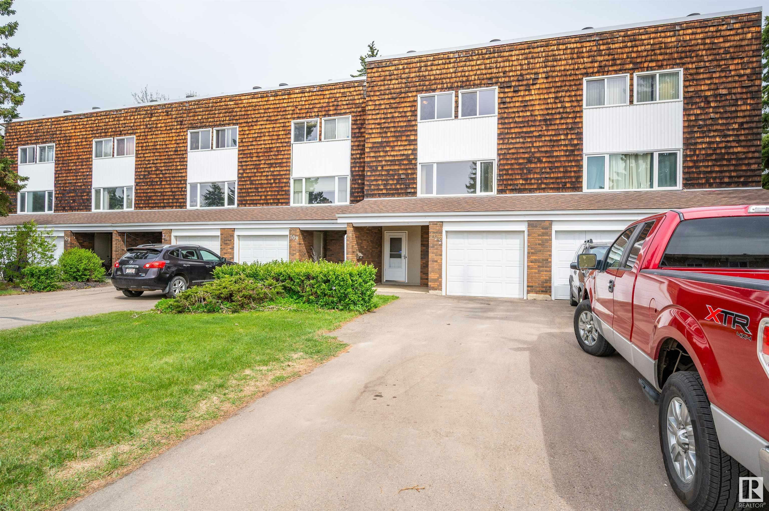 Property Photo: 102 Great Oaks AB T8A 0V8