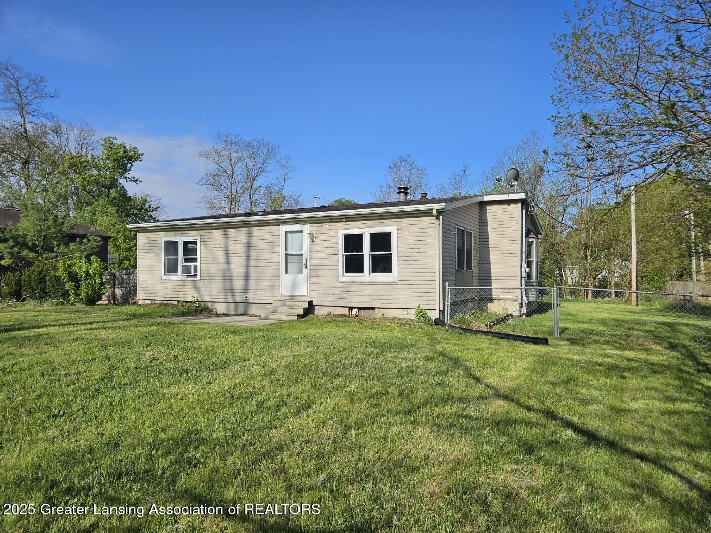 Property Photo:  6815 Aurelius Road  MI 48911 